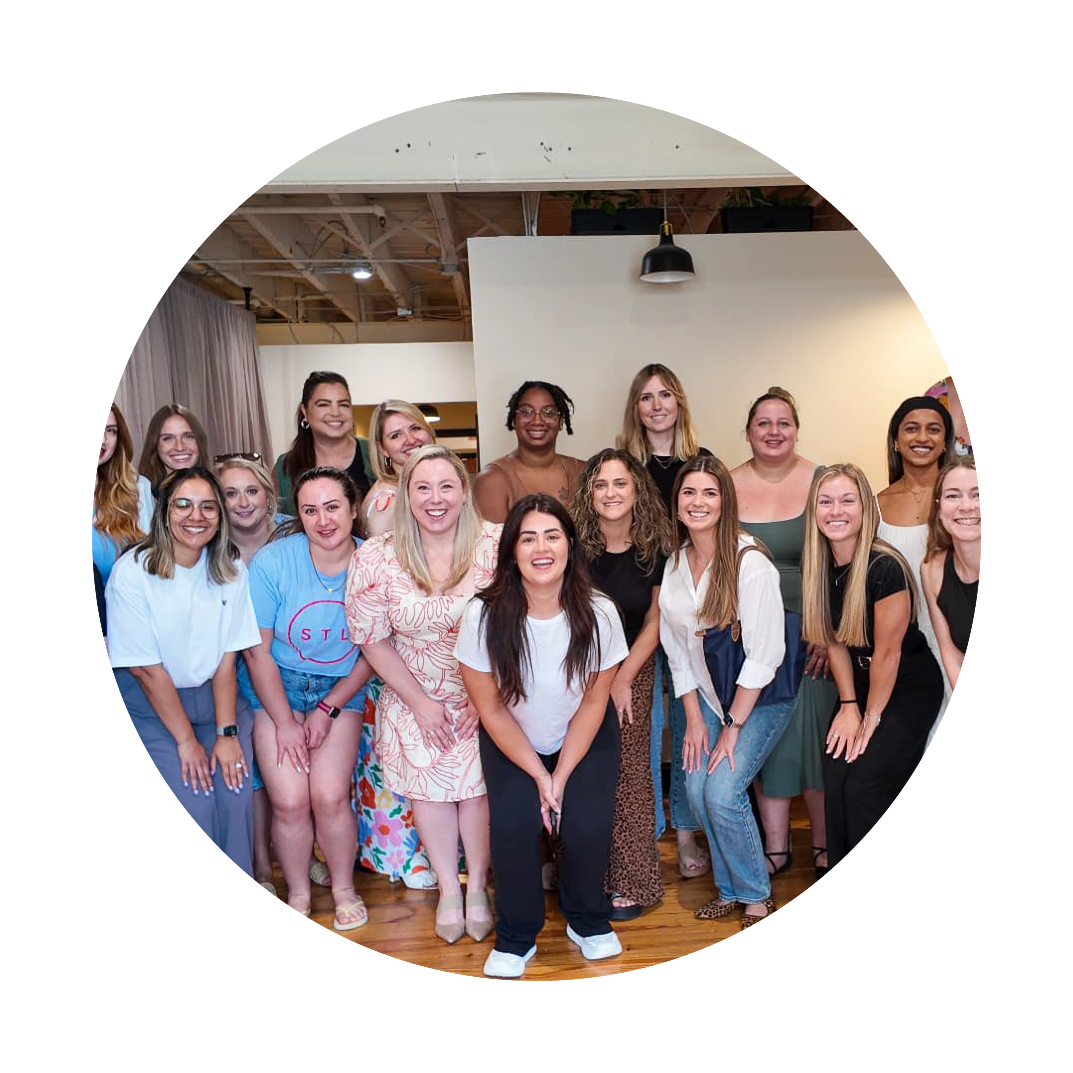 Group of women posing together in a casual setting