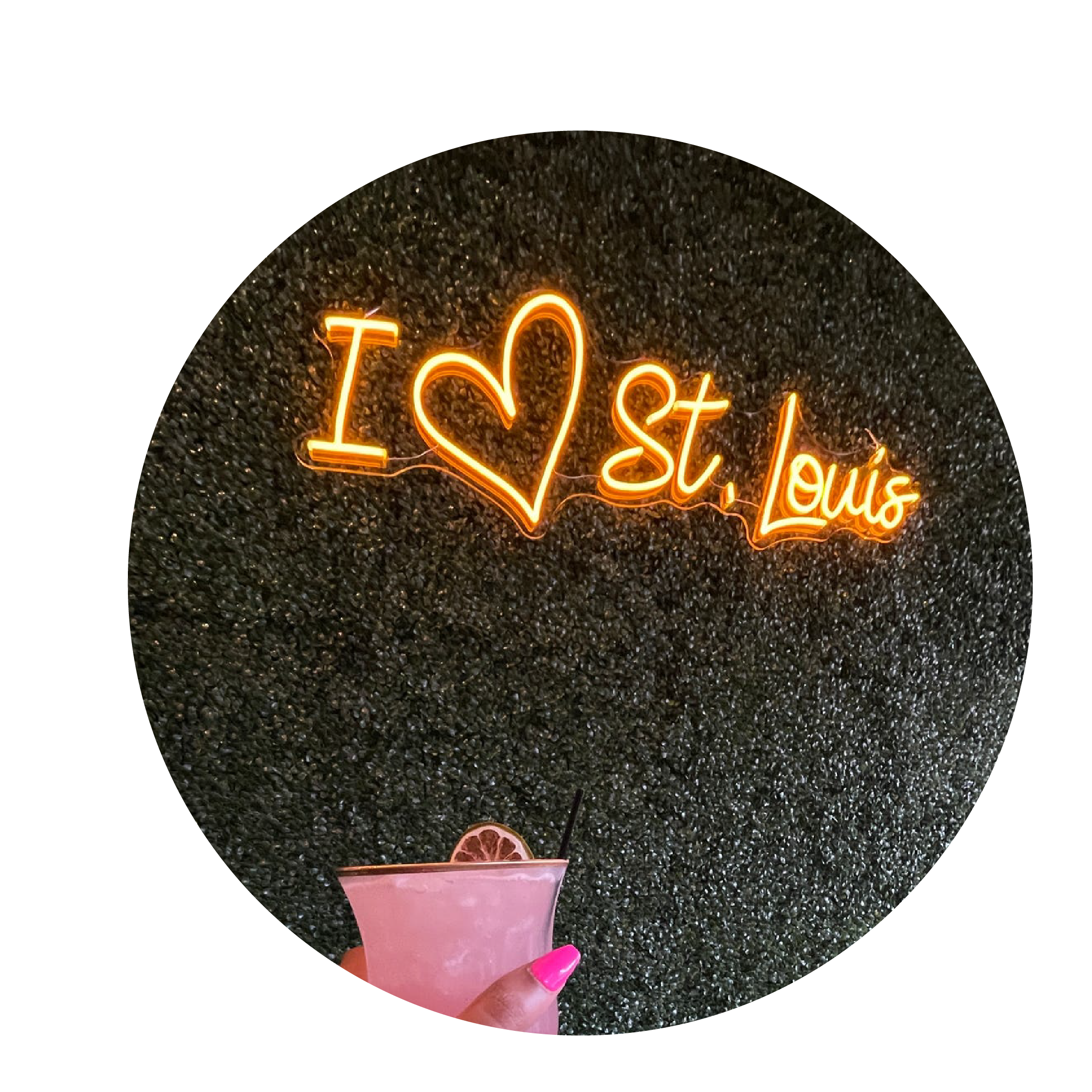 Neon sign with 'I ❤️ St Louis' on a dark background