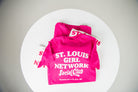 Pink t-shirt with 'St. Louis Girl Network Social Club' text on a white background