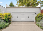 Modern garage door with decorative elements on a sunny day