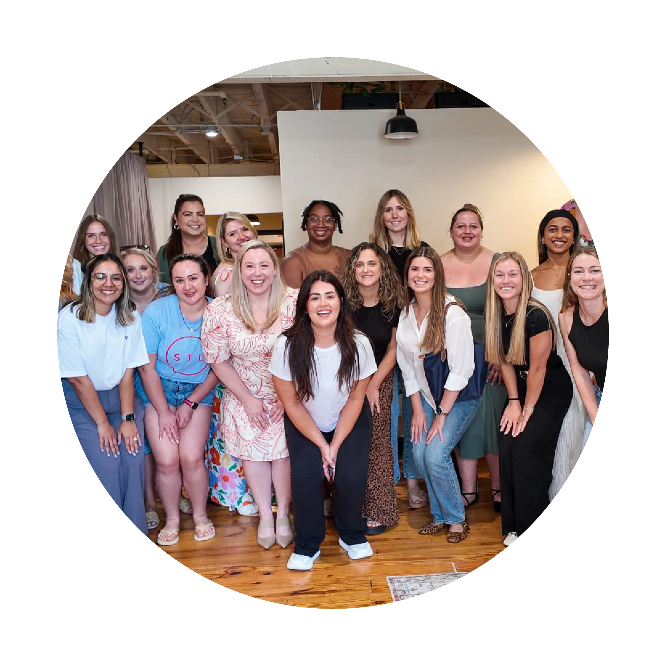 Group of women posing together in a casual setting